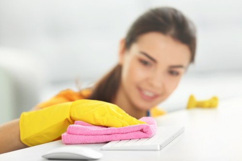 Office cleaning team maintaining a modern reception area