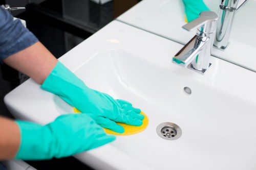 Professional office cleaning of desks and shared workspaces