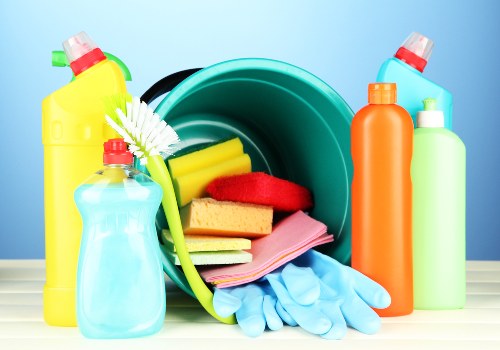 Essential house cleaning products and tools arranged for easy use