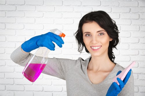 Detailed office cleaning in a busy breakroom area